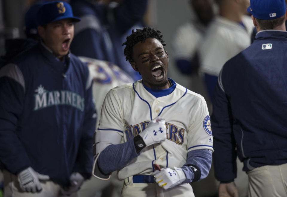 Dee Gordon reminded everyone of Ken Griffey Jr. on Sunday. (Photo by Stephen Brashear/Getty Images)