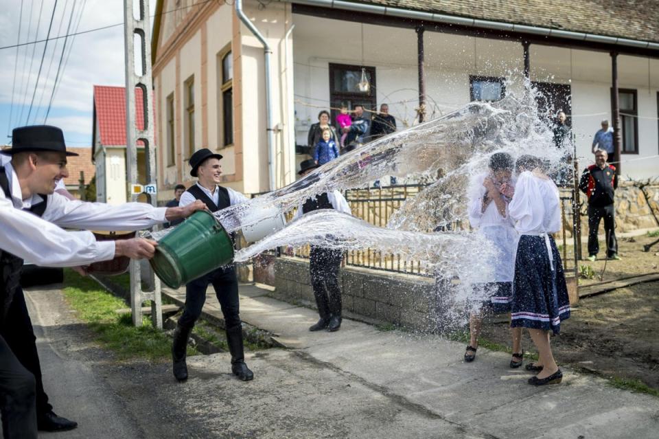 Women are doused in water as a part of a centuries-old Easter tradition in Hungary