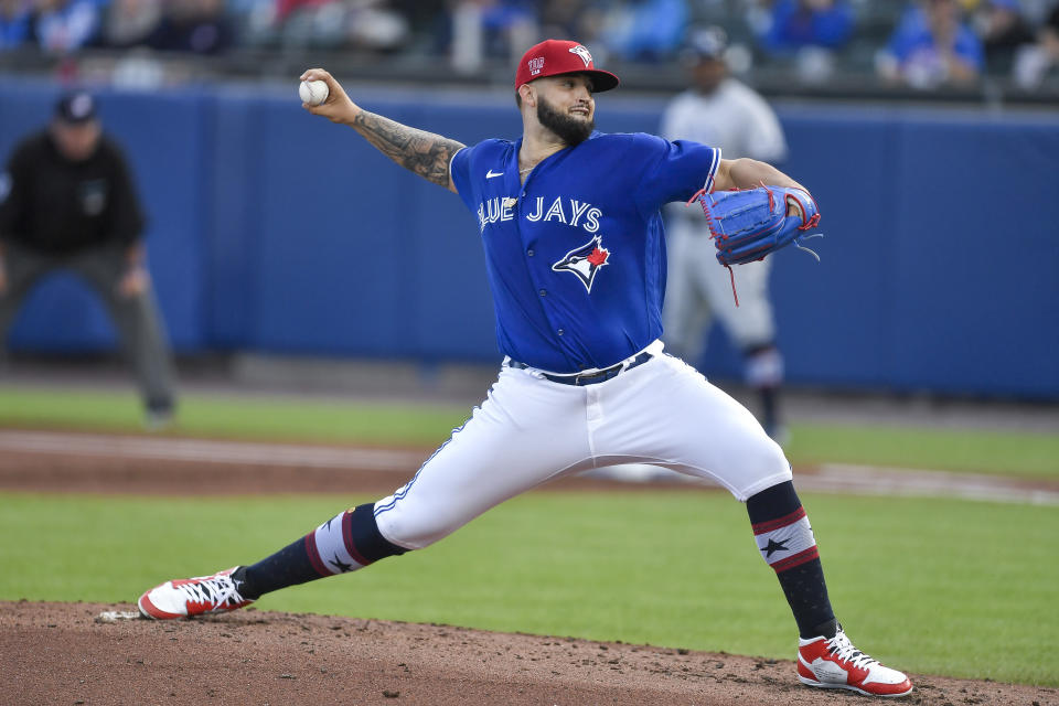 Toronto Blue Jays pitcher Alek Manoah throws to a Tampa Bay Rays batter during the second inning of a baseball game in Buffalo, N.Y., Friday, July 2, 2021. (AP Photo/Adrian Kraus)