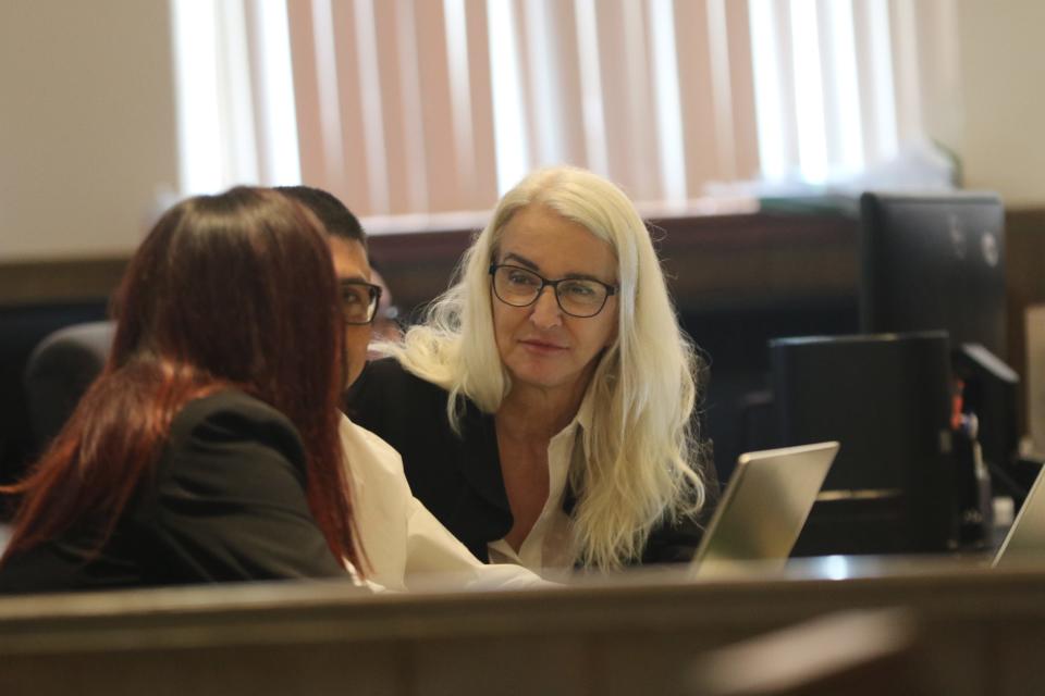 Defense Attorney Lisa Torraco speaks with her client Manuel Sanchez during Sanchez's murder trial, Oct. 18, 2023 in Fifth Judicial District Court.