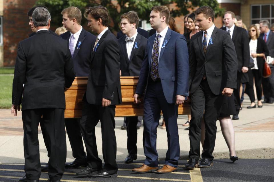 The casket of Mr Warmbier is carried out from his funeral (Getty Images)