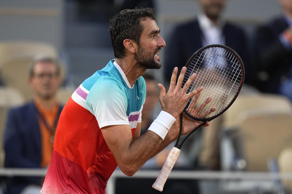 Croatia's Marin Cilic reacts as he plays Norway's Casper Ruud during their semifinal of the French Open tennis tournament at the Roland Garros stadium Friday, June 3, 2022 in Paris. (AP Photo/Michel Euler)