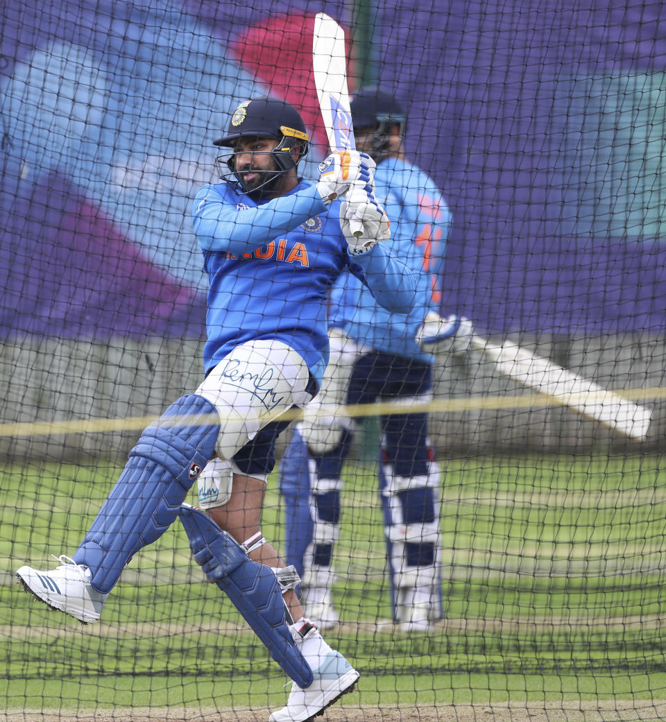 India's Rohit Sharma bats in the nets during a training session ahead of their Cricket World Cup match against Afghanistan at the Hampshire Bowl in Southampton, England, Wednesday, June 19, 2019. (AP Photo/Aijaz Rahi)