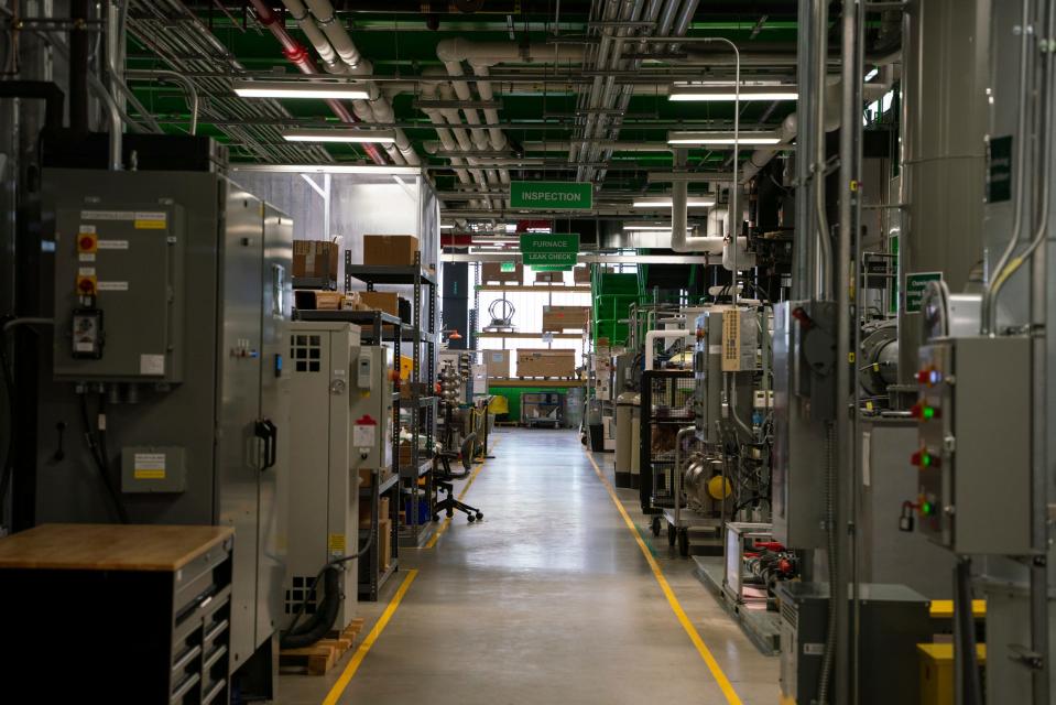 Various workstations are set up to complete intricate multistep processes inside the Facility for Rare Isotope Beams (FRIB) at Michigan State University in East Lansing on Tuesday, Aug. 1, 2023.