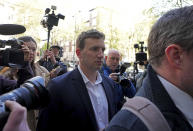 Former British parliamentary researcher Christopher Cash arrives at Westminster Magistrates' Court where he faces an Official Secrets Act charge related to allegedly gathering information for China, in London, Friday April 26, 2024. (Jeff Moore/PA via AP)