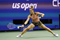 Maria Sakkari, of Greece, hits a forehand to Karolina Pliskova, of the Czech Republic, during the quarterfinals of the U.S. Open tennis tournament Wednesday, Sept. 8, 2021, in New York. (AP Photo/Frank Franklin II)