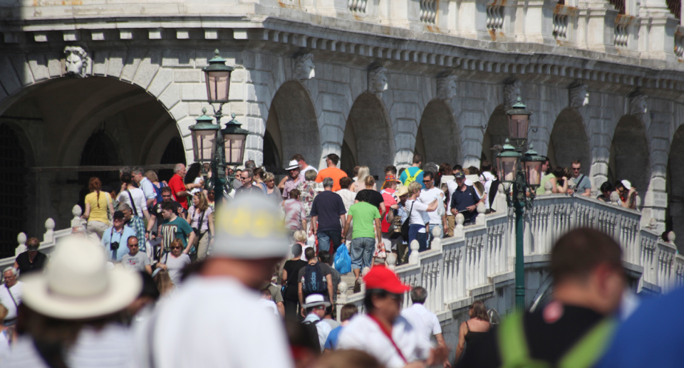 Crowds of travellers are seen in Venice, Italy, as the city introduces a new tourist tax. 