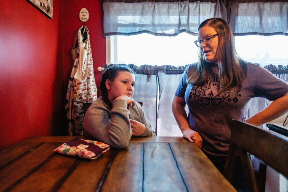 Heather Slemmer and her daughter, Sofia, 10, at their home in Sugarcreek. Sophia made and sold hot chocolate bags last year and used the proceeds to purchase NillyNoggins for other children under going testing at the hospital.