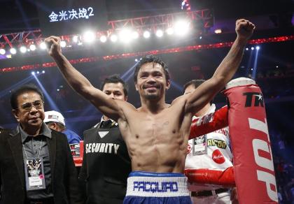 WBO welterweight champion Manny Pacquiao. (AP Photo/Kin Cheung)