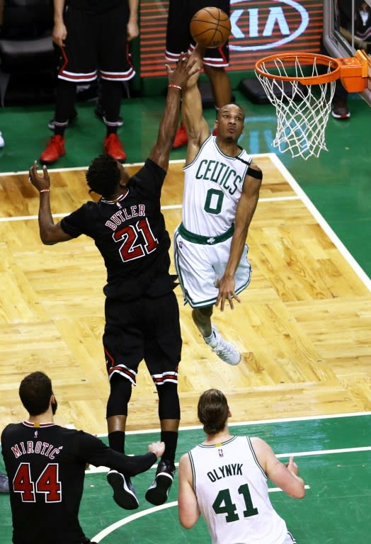 Avery Bradley of the Boston Celtics takes a shot against Jimmy Butler of the Chicago Bulls in Game Five of the Eastern Conference quarter-finals, at TD Garden in Boston, Massachusetts, on April 26, 2017