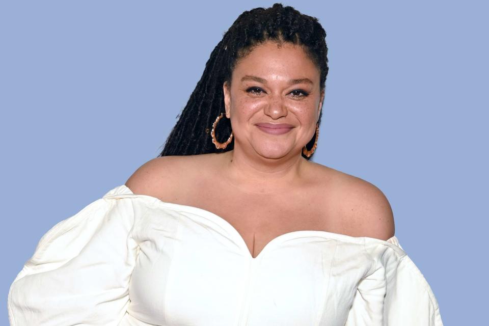 <p>Bryan Bedder/Getty Images</p> Photo of Michelle Buteau wearing white