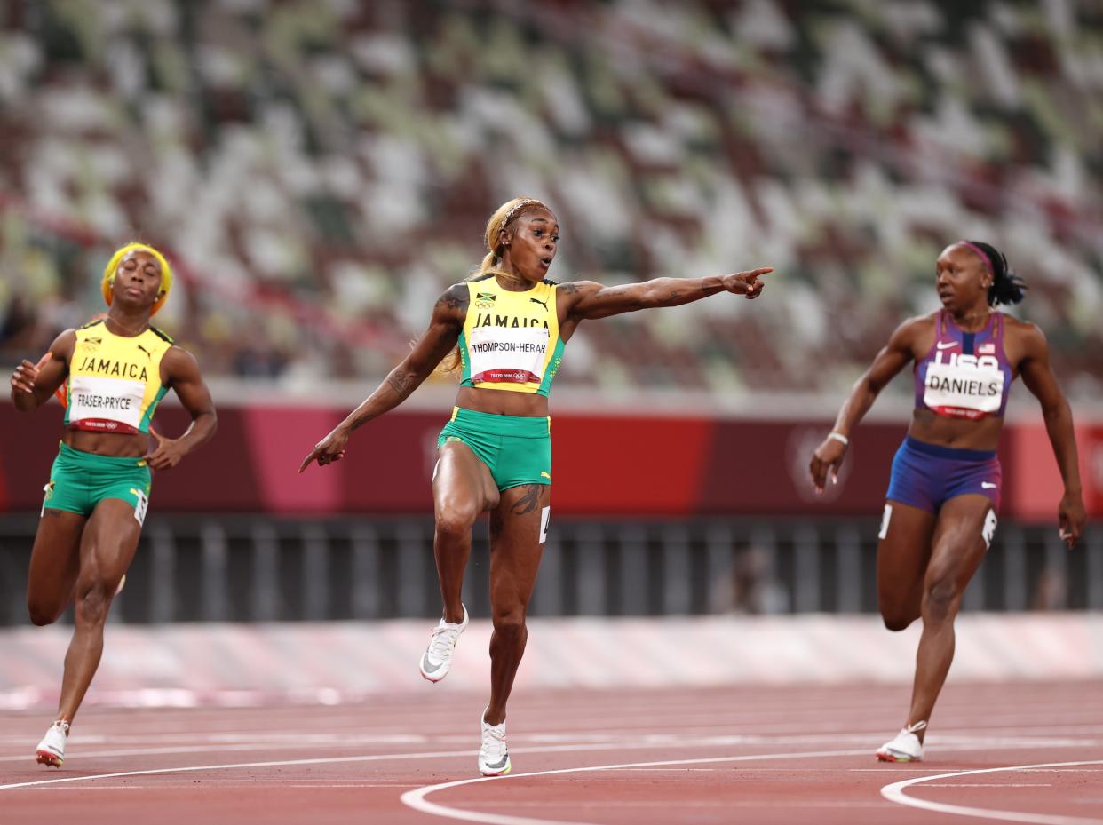 Elaine Thompson-Herah of Team Jamaica wins the women’s 100m final (Getty Images)