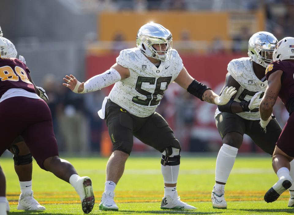 Nov 18, 2023; Tempe, Arizona, USA; Oregon Ducks offensive lineman Jackson Powers-Johnson (58) against the Arizona State Sun Devils at Mountain America Stadium. Mandatory Credit: Mark J. Rebilas-USA TODAY Sports