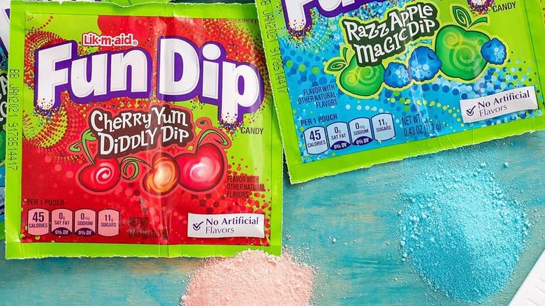 Packets of blue and red Fun Dip powder candy