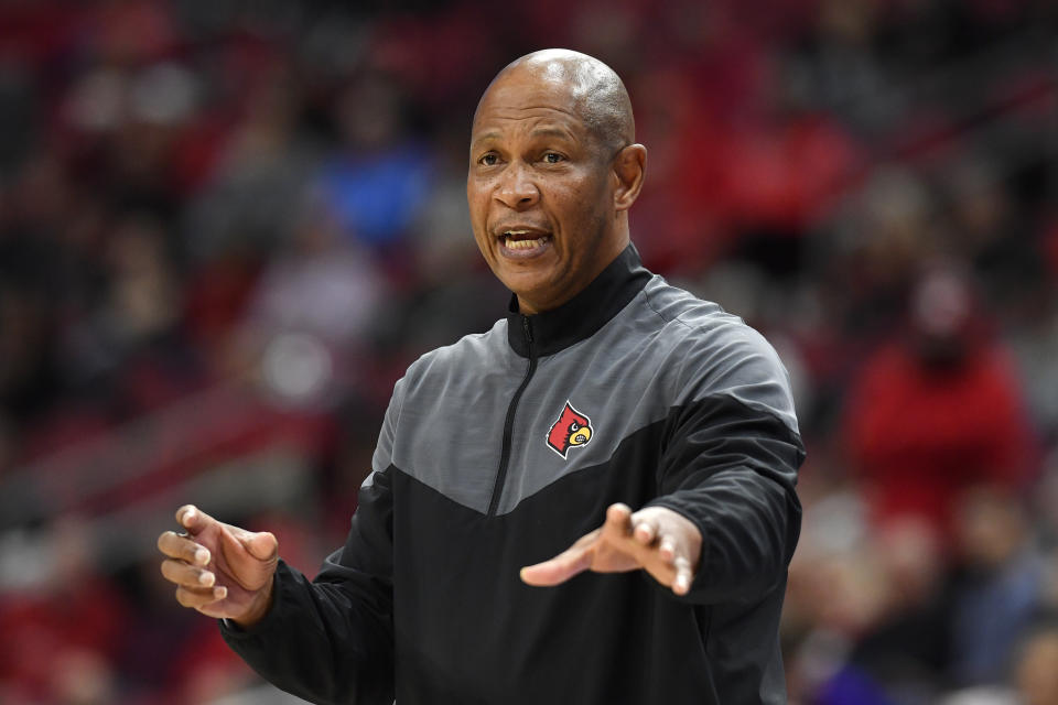 Louisville head coach Kenny Payne instructs his team during the second half of an NCAA college basketball game against Lipscomb in Louisville, Ky., Tuesday, Dec. 20, 2022. Lipscomb won 75-67. (AP Photo/Timothy D. Easley)