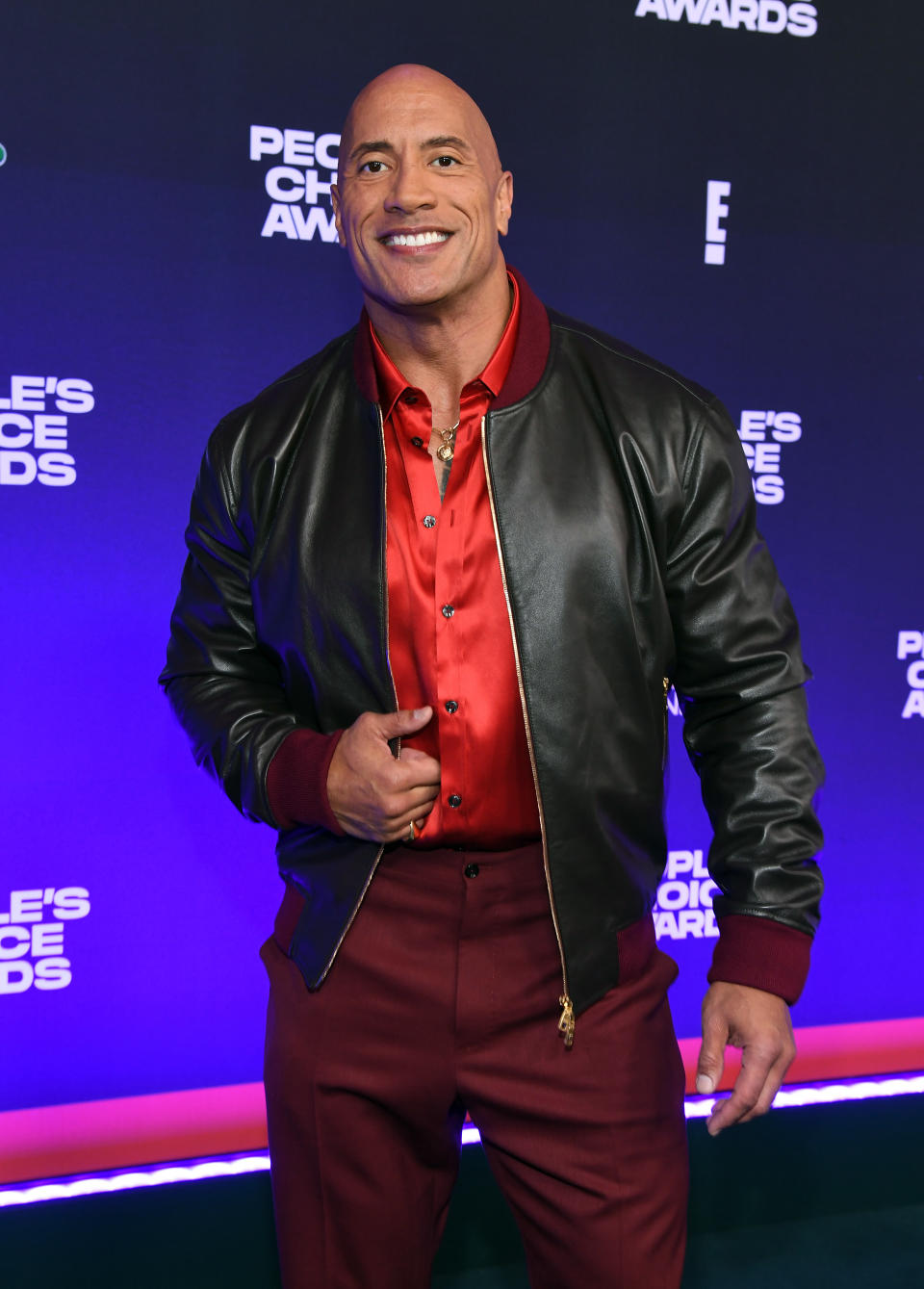 SANTA MONICA, CALIFORNIA - DECEMBER 07: Dwayne Johnson attends the People's Choice Awards at Barker Hangar on December 07, 2021 in Santa Monica, California. (Photo by Kevin Mazur/Getty Images for DJ)