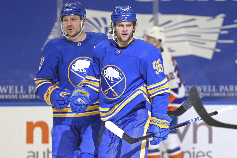 Buffalo Sabres forward Anders Bjork (96) celebrates his goal with forward Sam Reinhart (23) during the third period of an NHL hockey game against the New York Islanders, Tuesday, May 4, 2021, in Buffalo, N.Y. (AP Photo/Jeffrey T. Barnes)