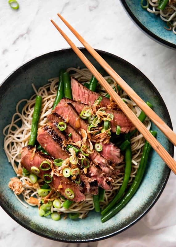 <p>A seriously tasty bowl of noodle goodness! These beef soba noodles are dressed with a fantastic dressing reminiscent of traditional Japanese soba sauce. Quick to make, you’ll have this on the table in just 15 minutes.</p><p><strong>Get the recipe: <a href="https://www.recipetineats.com/beef-bean-soba/" rel="nofollow noopener" target="_blank" data-ylk="slk:Beef Soba Noodles with Green Beans;elm:context_link;itc:0;sec:content-canvas" class="link rapid-noclick-resp"><em>Beef Soba Noodles with Green Beans</em></a></strong></p>