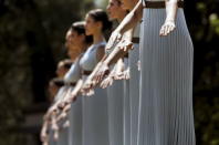 Priestesses dance inside the ancient Olympic Stadium during the dress rehearsal for the Olympic flame lighting ceremony for the Rio 2016 Olympic Games at the site of ancient Olympia in Greece. REUTERS/Yannis Behrakis