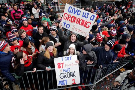 Feb 4, 2015; Boston, MA, USA; New England Patriots fans hold up signs for end Rob Gronkowski (not pictured) during the Super Bowl XLIX-New England Patriots Parade. Mandatory Credit: Greg M. Cooper-USA TODAY Sports