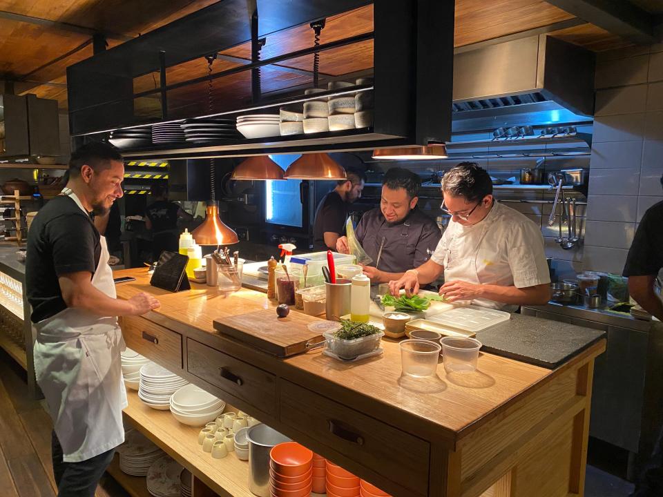 Chefs working at the Migrant restaurant in Mexico City