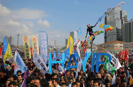 FILE PHOTO: Pro-Kurdish opposition Peoples' Democratic Party (HDP) and "Hayir" ("No") supporters attend a rally for the upcoming referendum in Istanbul, Turkey, April 8, 2017. REUTERS/Huseyin Aldemir/File Photo