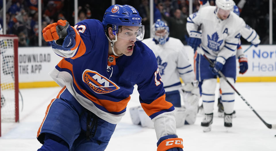 UNIONDALE, NY - NOVEMBER 13: New York Islanders Center Mathew Barzal (13) reacts to scoring a goal during the first period of the National Hockey League game between the Toronto Maple Leafs and the New York Islanders on November 13, 2019, at the Nassau Veterans Memorial Coliseum in Uniondale, NY. (Photo by Gregory Fisher/Icon Sportswire via Getty Images)