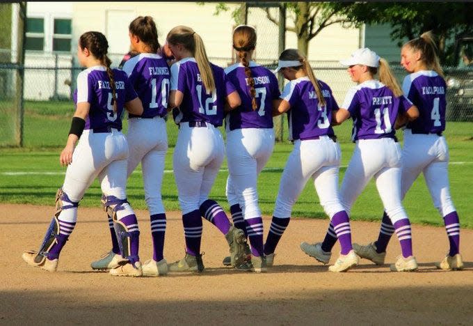 Triway seniors (L-R) Madison Fatzinger, Clowie Flinner, Katie Hoffa, Emma Hudson, Hailey Massaro, Haylee Pruitt and Emily Yacapraro make their final walk around the bases on their homefield.