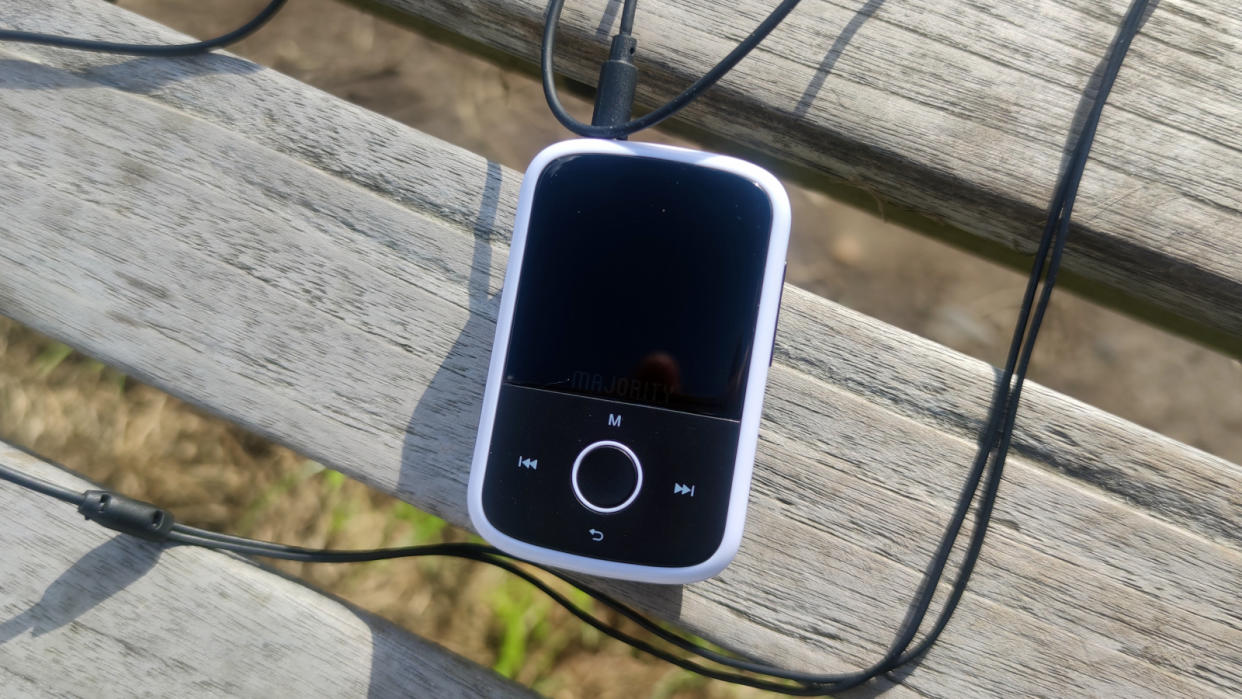  The Majority MP3 Player on a wooden bench. 