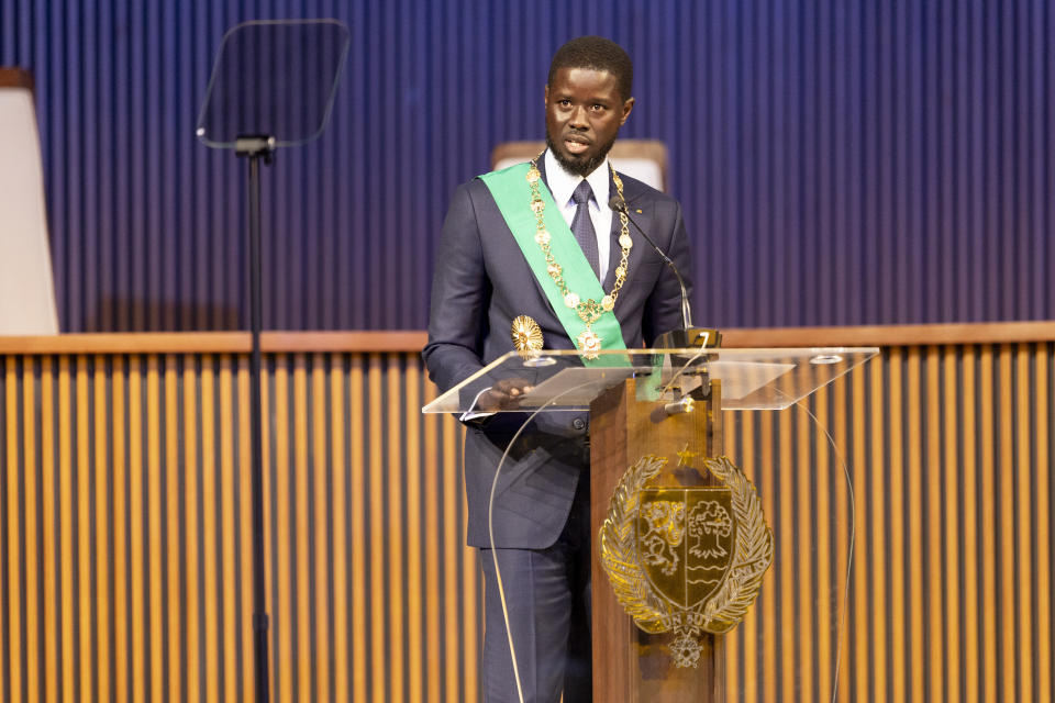 Bassirou Diomaye Faye delivers his inaugural speech after being sworn in as Senegal's president in Dakar, Senegal, Tuesday, April 2, 2024. Faye, 44, campaigned on promises to clean up corruption and better manage the country's natural resources. His victory was seen as reflecting the will of young people frustrated with widespread unemployment and former colonial ruler France, seen by critics to be using its relationship with Senegal to enrich itself. (AP Photo/Sylvain Cherkaoui)