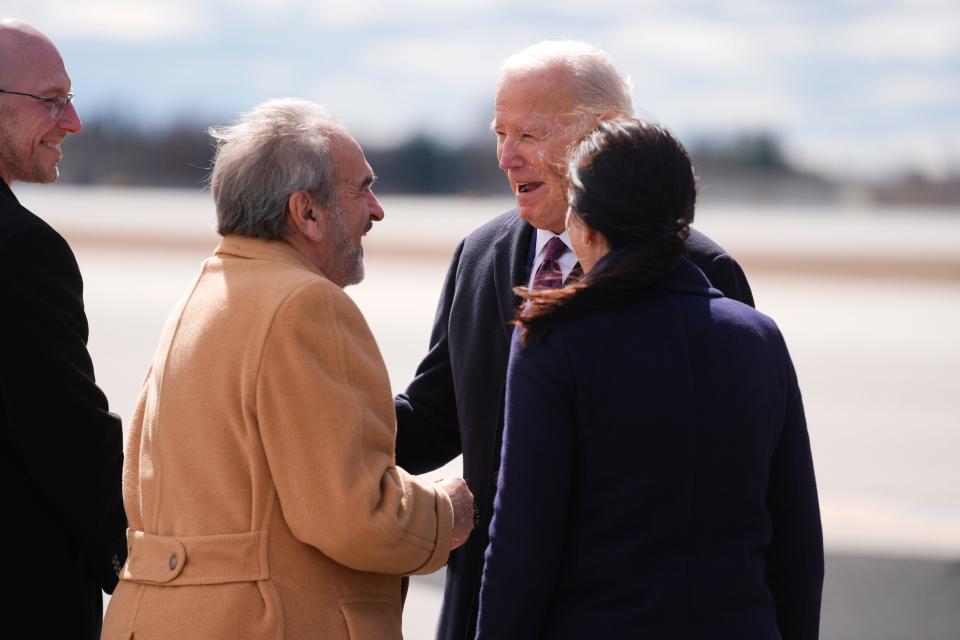 President Joe Biden is greeted as he arrives at Manchester-Boston Regional Airport Monday, March 11, 2024, in Manchester, N.H.