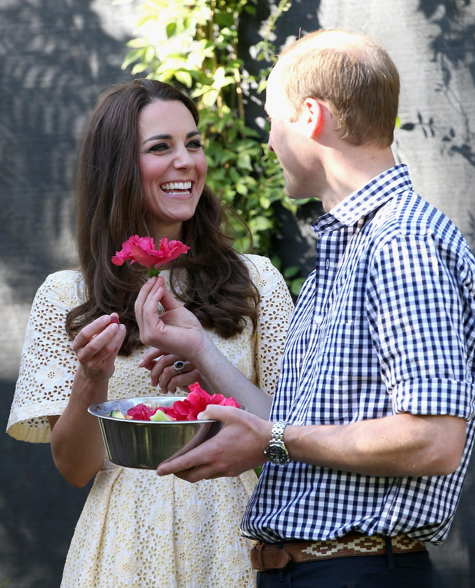 Receiving a flower from Prince William in Sydney, Australia, in April 2014