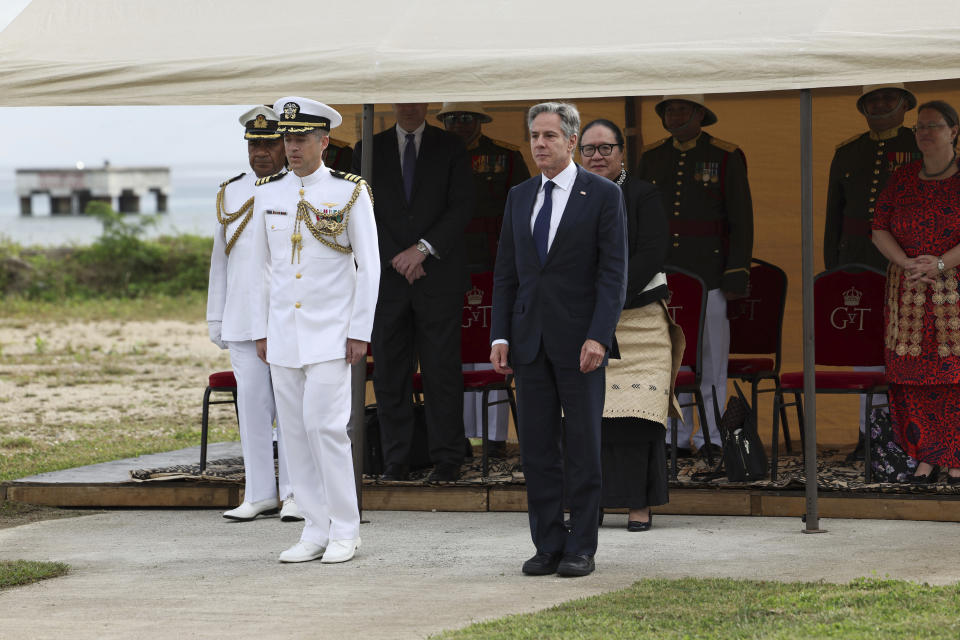 U.S. Secretary of State Antony Blinken, front right, attends a wreath-laying ceremony at Tonga's War Memorial in Nuku'alofa, Tonga Wednesday, July 26, 2023. (Tupou Vaipulu/Pool Photo via AP)