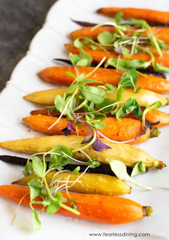 <p>Fearless Dining</p><p>This kid-friendly maple-roasted carrots recipe is so easy to make. It pairs with so many wonderful meals.</p><p><strong>Get the recipe: </strong><a href="https://www.fearlessdining.com/easy-maple-roasted-carrots/" rel="nofollow noopener" target="_blank" data-ylk="slk:Maple-Roasted Carrots;elm:context_link;itc:0;sec:content-canvas" class="link "><strong>Maple-Roasted Carrots</strong></a></p>