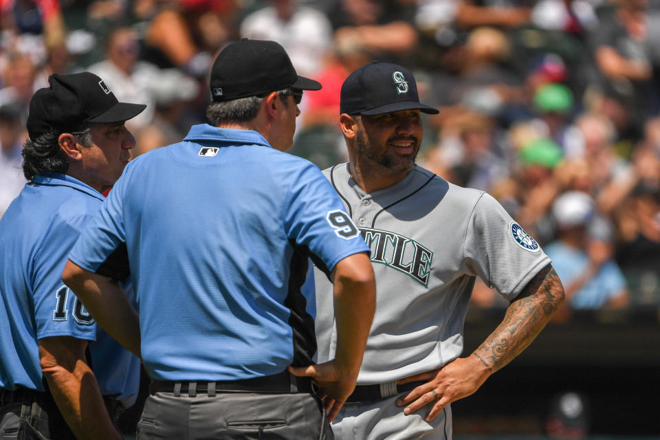 Mariners pitcher Hector Santiago was ejected from the game after umpires inspected his glove. (Photo by Quinn Harris/Getty Images)