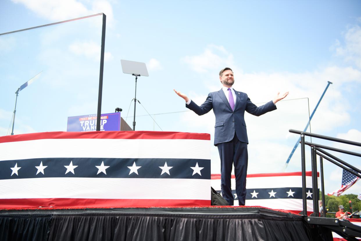 Republican Vice-Presidential candidate, U.S. Sen. J.D. Vance, (R-OH), greets a crowd before Republican Presidential candidate, former U.S. president, Donald Trump, offers remarks during an event on Aug. 21 in Asheboro at the North Carolina Aviation Museum and Hall of Fame.