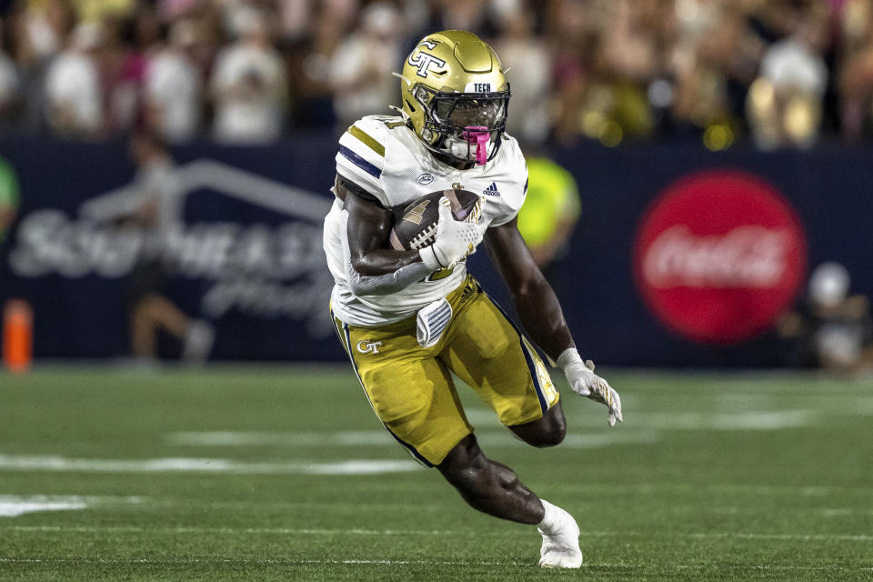 Georgia Tech running back Jamal Haynes (11) runs the ball in the first quarter of a football game against the Duke, during an NCAA college football game, Saturday, Oct. 5, 2024, in Atlanta. (AP Photo/Jason Allen)