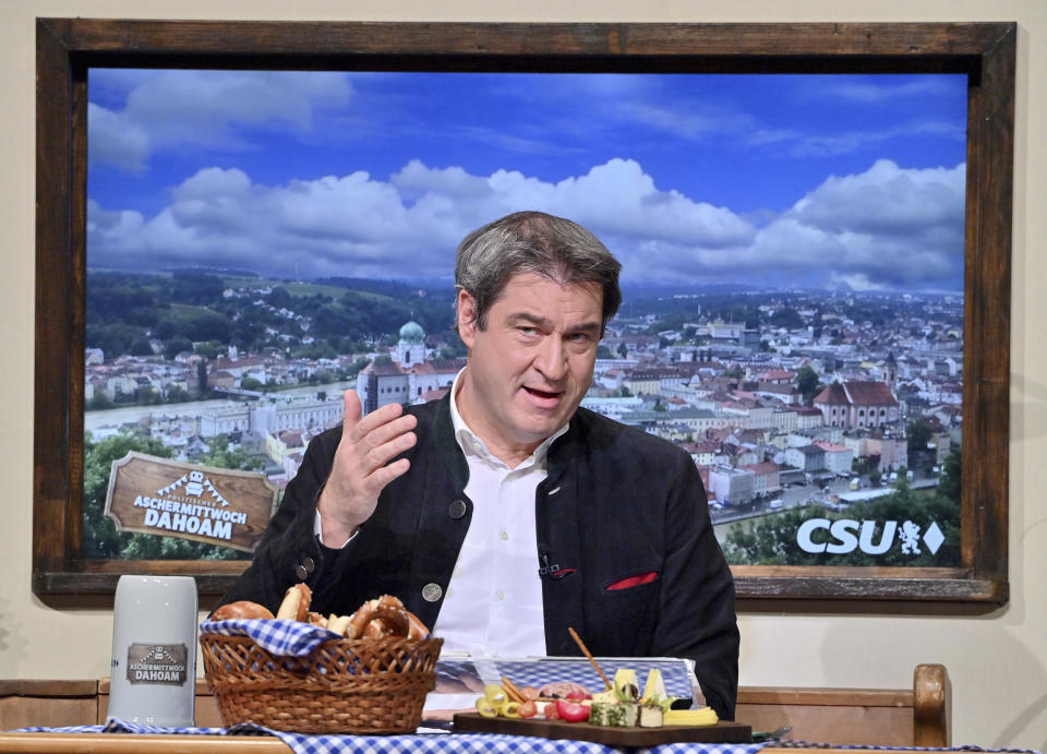 Bavarian Prime Minister Markus Soeder (CSU) speaks at the party's Political Ash Wednesday in Passau. Germany, Wednesday, Feb.17, 2021 Wednesday, Feb.17, 2021. Markus Soeder is many things: state governor of Bavaria, Star Trek fan, a conservative for whom combating climate change is an article of faith. The question Germans are asking now is: can the 54-year-old win enough backing across the political spectrum to succeed Angela Merkel as chancellor in September. (Peter Kneffel/Pool via AP)