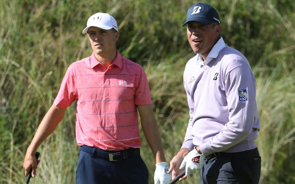 Spieth and Kuchar - Credit: AP Photo/Peter Morrison