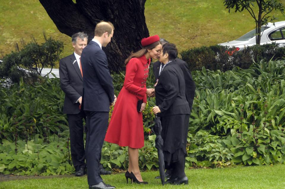 Britain's Prince William (L) watches as his wife Catherine, Duchess of Cambridge, receives a Maori welcome known as a 'Hongi' at a traditional Maori Powhiri Ceremonial Welcome at Government House in Wellington April 7, 2014 in this handout provided by Woolf Crown Copyright. The Prince and his wife Kate are undertaking a 19-day official visit to New Zealand and Australia with their son George. REUTERS/Woolf Crown Copyright/Handout via Reuters (NEW ZEALAND - Tags: ROYALS ENTERTAINMENT POLITICS) NO SALES. NO ARCHIVES. FOR EDITORIAL USE ONLY. NOT FOR SALE FOR MARKETING OR ADVERTISING CAMPAIGNS. ATTENTION EDITORS - THIS IMAGE HAS BEEN SUPPLIED BY A THIRD PARTY. THIS PICTURE IS DISTRIBUTED EXACTLY AS RECEIVED BY REUTERS, AS A SERVICE TO CLIENTS. REUTERS IS UNABLE TO INDEPENDENTLY VERIFY THE AUTHENTICITY, CONTENT, LOCATION OR DATE OF THIS IMAGE. MANDATORY CREDIT