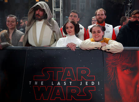 People dressed in costume wait for arrivals at the European Premiere of 'Star Wars: The Last Jedi', at the Royal Albert Hall in central London, Britain December 12, 2017. REUTERS/Hannah McKay