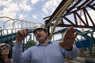Alessandro Zamperla, president & CEO of Central Amusement International, tours the construction site of his company's new rides in amusement park district of Coney Island, Friday, June 17, 2022, in the Brooklyn borough of New York. Luna Park in Coney Island will open three new major attractions this season alongside new recreational areas and pedestrian plazas. (AP Photo/John Minchillo)