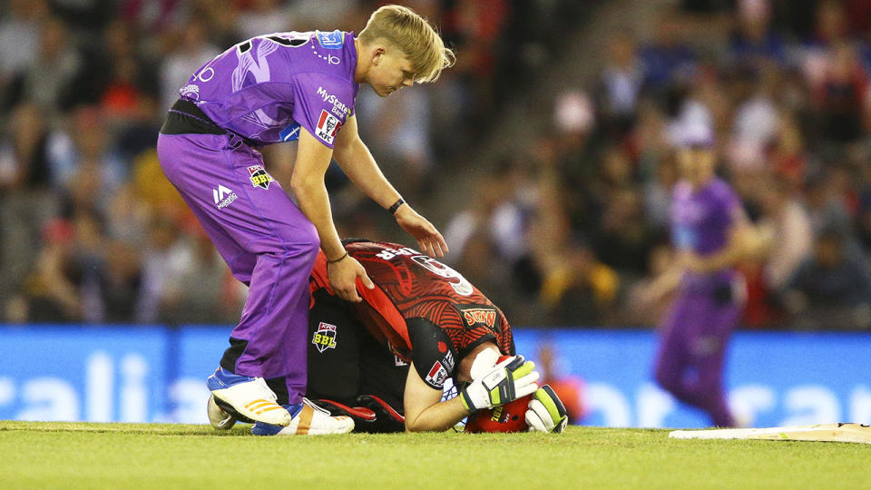 Nathan Ellis, pictured here checking on Sam Harper after the nasty collision.