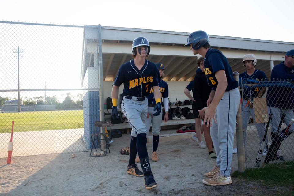 Naples' Johnny King (3) walks is introduced before the FHSAA Class 5A-District 14 baseball championship between Naples High School and Barron Collier High School, Thursday, May 5, 2022, at Barron Collier High School in Naples, Fla.Barron Collier defeated Naples 5-1 to win the Class 5A-District 14 title.