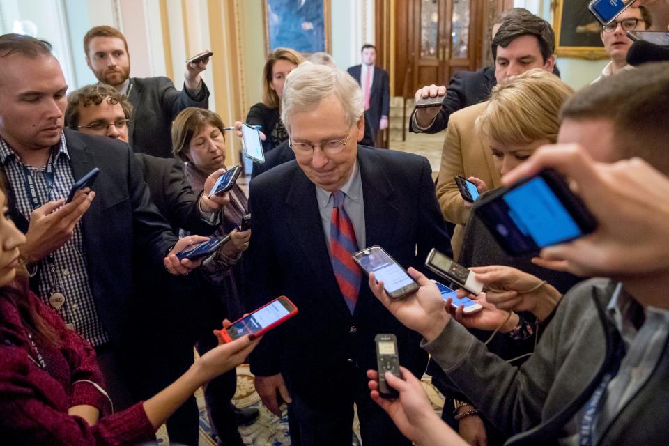 Senate Majority Leader Mitch McConnell of Ky. speaks to reporters as he walks out of the Senate Chamber on Capitol Hill in Washington, Friday, Jan. 25, 2019, after President Donald Trump says a deal has been made to reopen the government for three weeks.