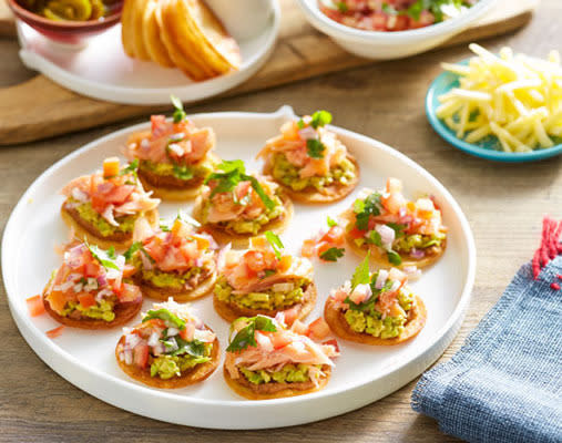 Guests can pick and choose toppings to customise their own tostadas. And for the budget-conscious, this is a clever way to make a little salmon go a lot further. RECIPE: Hot-smoked salmon tostadas with guacamole