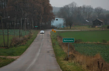 A car is pictured on the road in Kalinowka, Poland November 25, 2018. REUTERS/Kacper Pempel/Files