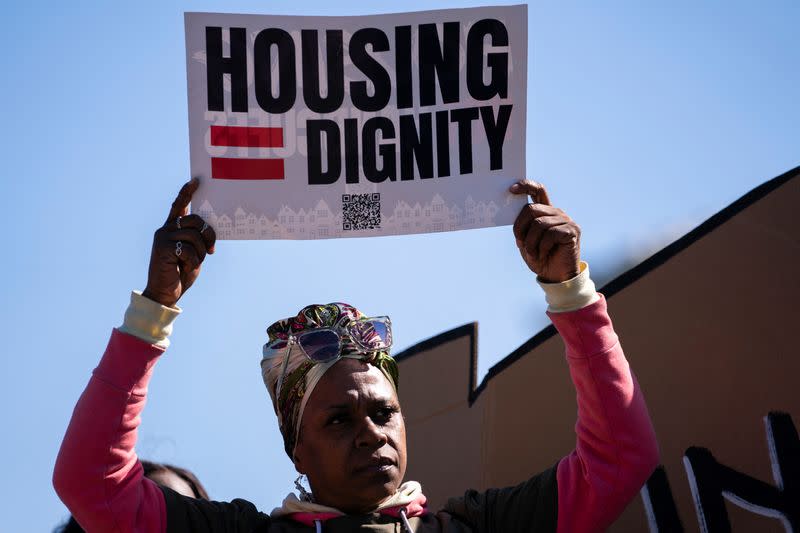 People protest as the U.S. Supreme Court reviews anti-camping laws that impact homeless, in Washington