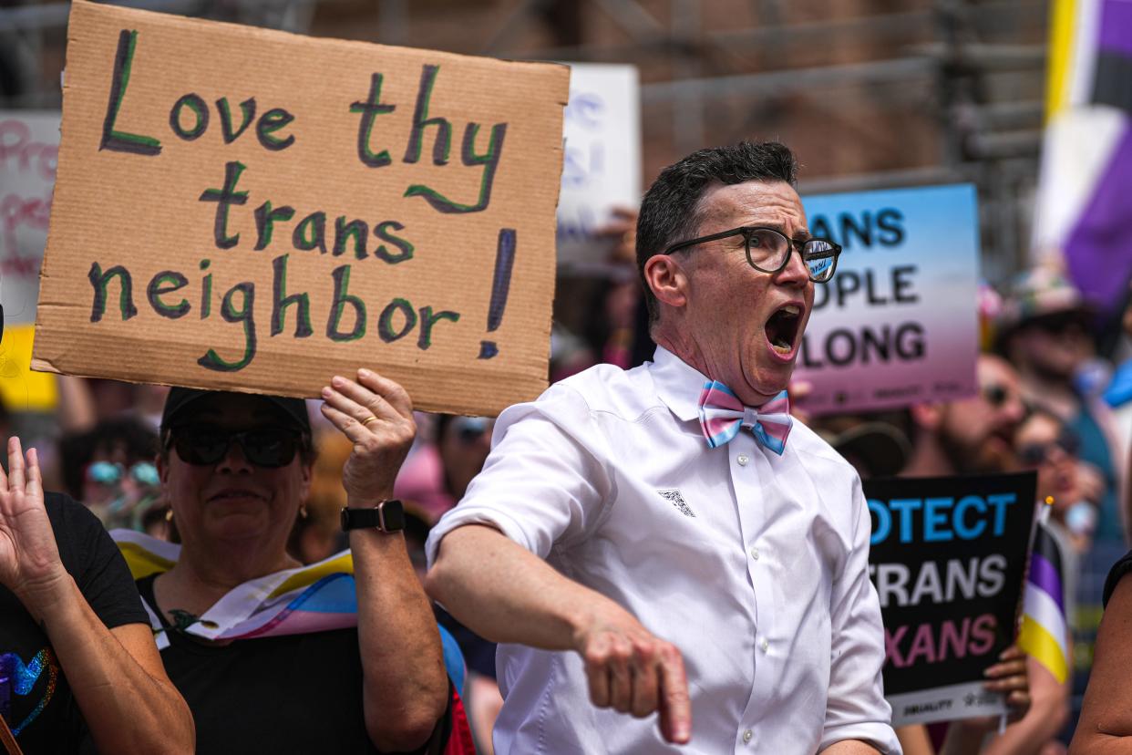 Morgan Davis chants with hundreds of protesters on the south steps of the Capitol during the Queer Capitol March in April 2023 in Austin. A year later, activists are divided on a Title IX update.