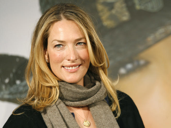 German model Tatjana Patitz smiles as she presents the new catalogue of the OTTO group in Hamburg December 14, 2006.   REUTERS/Christian Charisius  (GERMANY)